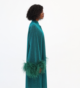 Emerald Green
Luxury Kaftan
Dubai
Sarah Kaftan Dress
Shimmering Lurex Fabric
Hand-Applied Ostrich Feathers
Button-Down Kaftan
Satin Slip Dress
Elegant Kaftan Dress
Statement Evening Wear
Day-to-Night Kaftan
Artisanal Fashion
High-End Kaftan
Ostrich feathers 
Kaftan 
Handmade 
Hand crafted 
Sustainable 
Luxurious 
Empowering 
Green label 
Autism 
Fabric 



