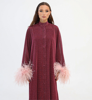 Burgundy Luxury Kaftan
Dubai
Shimmering Lurex Fabric
Handmade Artistry
Hand-Applied Ostrich Feathers
Button-Down Kaftan Dress
Satin Slip Dress
Elegant Kaftan Dress
Statement Evening Wear
Ostrich Feather Trim
Handmade
Artistry
Ostrich Feathers
Artisans
Made to Order