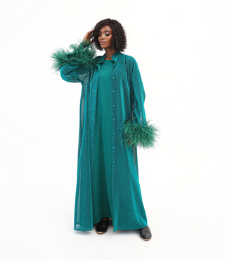 Emerald Green
Luxury Kaftan
Dubai
Sarah Kaftan Dress
Shimmering Lurex Fabric
Hand-Applied Ostrich Feathers
Button-Down Kaftan
Satin Slip Dress
Elegant Kaftan Dress
Statement Evening Wear
Day-to-Night Kaftan
Artisanal Fashion
High-End Kaftan
Ostrich feathers 
Kaftan 
Handmade 
Hand crafted 
Sustainable 
Luxurious 
Empowering 
Green label 
Autism 
Fabric 



