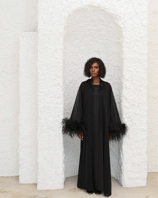 Black
Luxury Kaftan
Dubai
Sarah Kaftan Dress
Shimmering Lurex Fabric
Handmade Artistry
Hand-Applied Ostrich Feathers
Button-Down Kaftan
Satin Slip Dress
Elegant Kaftan Dress
Statement Evening Wea
Ostrich feather trim
Handmade 
Artistry 