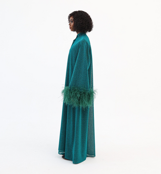 Emerald Green
Luxury Kaftan
Dubai
Sarah Kaftan Dress
Shimmering Lurex Fabric
Hand-Applied Ostrich Feathers
Button-Down Kaftan
Satin Slip Dress
Elegant Kaftan Dress
Statement Evening Wear
Day-to-Night Kaftan
Artisanal Fashion
High-End Kaftan
Ostrich feathers 
Kaftan 
Handmade 
Hand crafted 
Sustainable 
Luxurious 
Empowering 
Green label 
Autism 
Fabric 



