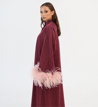 Burgundy Luxury Kaftan
Dubai
Shimmering Lurex Fabric
Handmade Artistry
Hand-Applied Ostrich Feathers
Button-Down Kaftan Dress
Satin Slip Dress
Elegant Kaftan Dress
Statement Evening Wear
Ostrich Feather Trim
Handmade
Artistry
Ostrich Feathers
Artisans
Made to Order